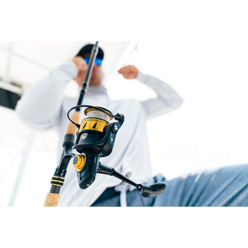 Load image into Gallery viewer, PENN Spinfisher VI Spinning Inshore/Nearshore Fishing Reel, HT-100 Front Drag, Max of 25lb | 11.3kg, Made with an All-Metal Reel Body and Spool Design,Black/Gold, 5500
